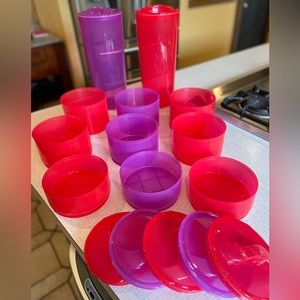 New (never used) 18 piece Joy Mangano Tub Twists Containers Ted and purple.